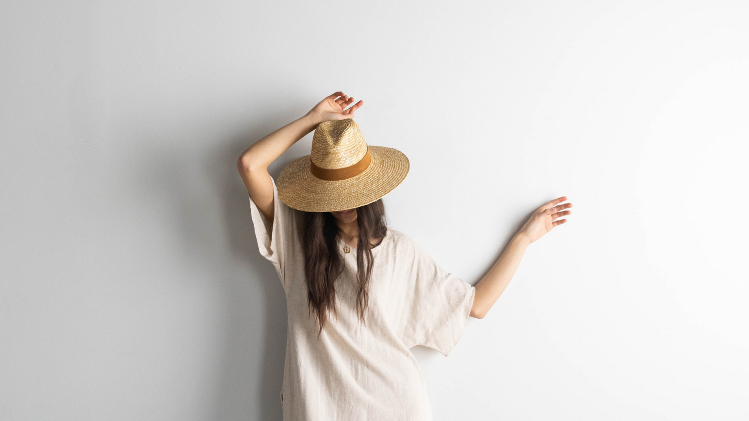 woman wearing a straw hat