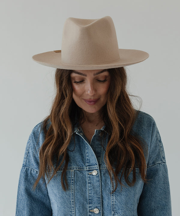 Gigi Pip felt hats for women - Ava Fedora - 100% australian wool felt fedora with a stiff upturned brim + pinched fedora crown, featuring a Gigi Pip embossed leather tab on the brim [cream]