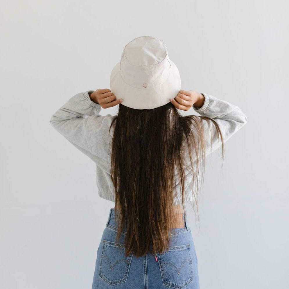 Gigi Pip bucket hats for women - Rylee Bucket Hat - 100% cotton bucket hat with a silk inner liner and an adjustable sweatband, featuring a gold Gigi Pip pin on the back of the crown [cream]