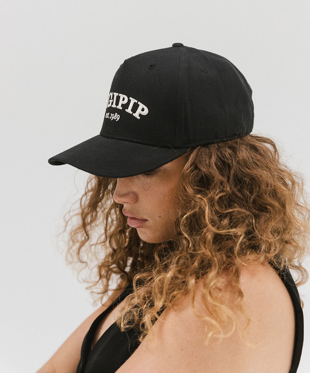 Gigi Pip trucker hats for women - Gigi Pip Canvas Trucker Hat - 100% Cotton Canvas w/ cotton sweatband + reinforced from panel with 100% polyester mesh trucker hats with gigi pip embroidered on the front panel with an adjustable velcro bag [black]