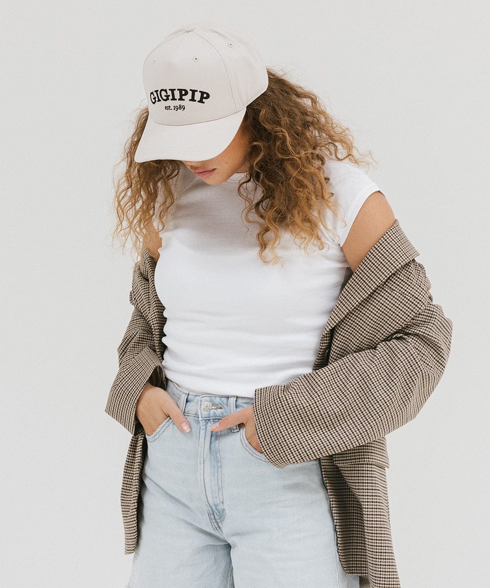 Gigi Pip trucker hats for women - Gigi Pip Canvas Trucker Hat - 100% Cotton Canvas w/ cotton sweatband + reinforced from panel with 100% polyester mesh trucker hats with gigi pip embroidered on the front panel with an adjustable velcro bag [cream]