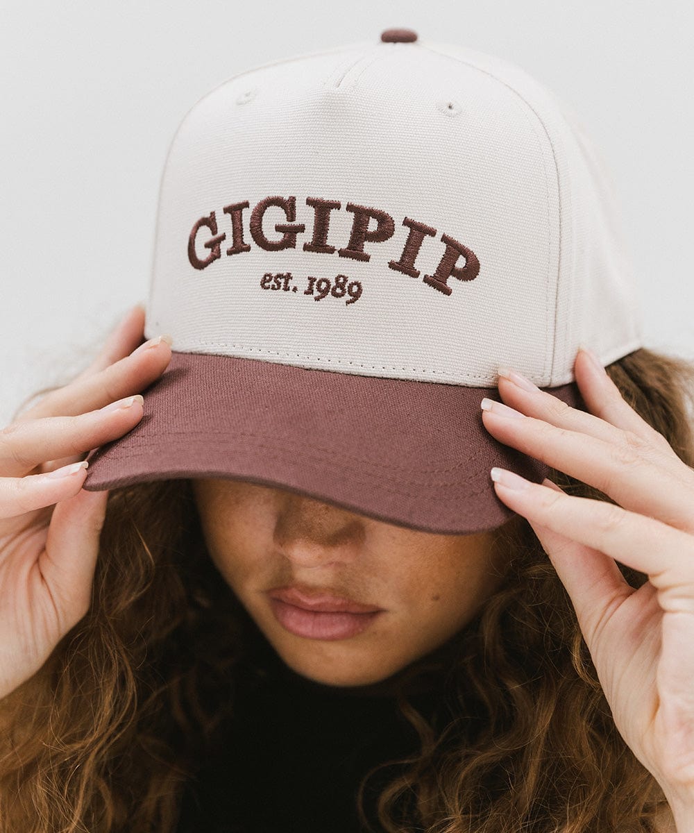 Gigi Pip trucker hats for women - Gigi Pip Canvas Trucker Hat - 100% Cotton Canvas w/ cotton sweatband + reinforced from panel with 100% polyester mesh trucker hats with gigi pip embroidered on the front panel with an adjustable velcro bag [cream-chocolate brown]