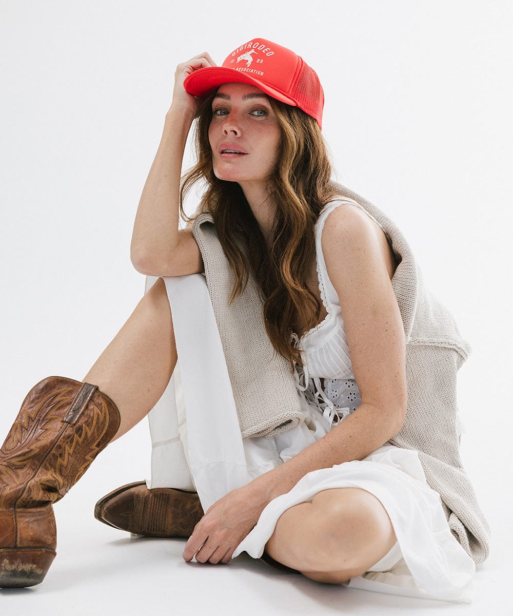 Gigi Pip trucker hats for women - Gigi Rodeo Foam Trucker Hat - 100% polyester foam + mesh trucker hat with a curved brim featuring the words "gigi rodeo" in a contrasting color as a design across the front panel [red]