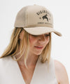 Gigi Pip trucker hats for women - Gigi Rodeo Foam Trucker Hat - 100% polyester foam + mesh trucker hat with a curved brim featuring the words "gigi rodeo" in a contrasting color as a design across the front panel [tan]