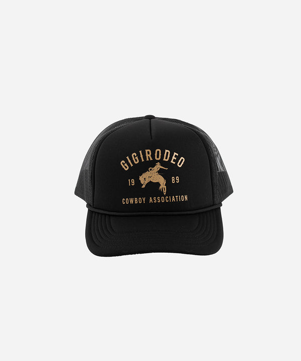 Gigi Pip trucker hats for women - Gigi Rodeo Foam Trucker Hat - 100% polyester foam + mesh trucker hat with a curved brim featuring the words "gigi rodeo" in a contrasting color as a design across the front panel [black]