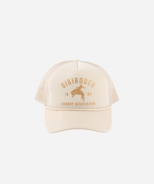 Gigi Pip trucker hats for women - Gigi Rodeo Foam Trucker Hat - 100% polyester foam + mesh trucker hat with a curved brim featuring the words "gigi rodeo" in a contrasting color as a design across the front panel [cream]