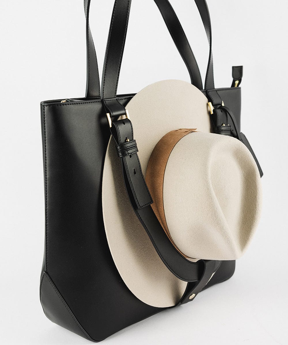 Gigi Pip luxury hat carrying totes for women - Leather Hat Carrying Tote - 100% genuine leather hat carrying tote featuring a "U" strap to cradle your hat to your bag + two interior pockets #color_black