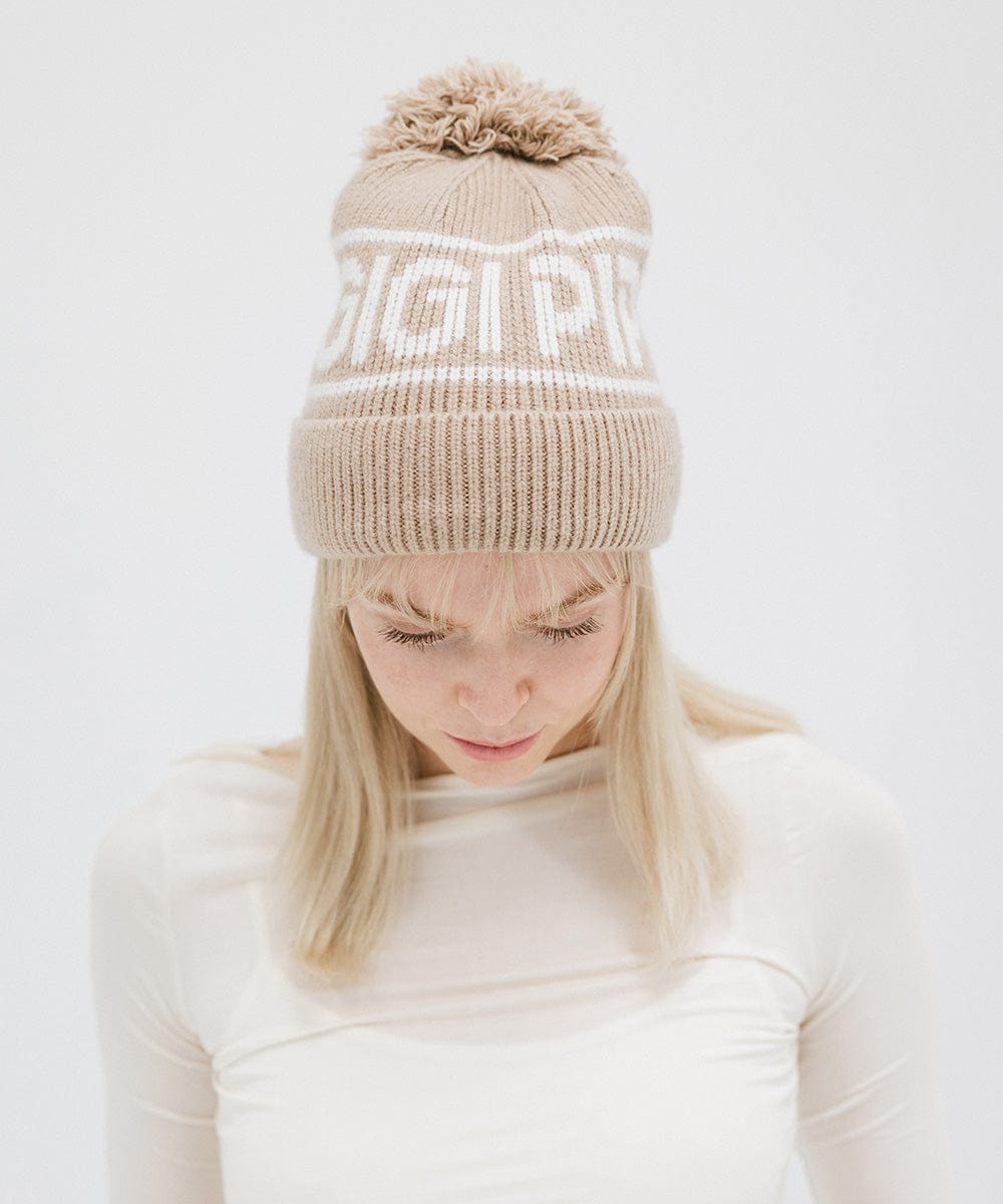 Gigi Pip beanies for women - Jane Retro Pom Beanie - retro inspired pom beanie featuring a limited edition Gigi Pip retro holiday logo [taupe]