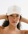 Gigi Pip trucker hats for women - Keep it Up Cowgirl Canvas Trucker Hat - 100% cotton canvas w/ cotton sweatband + reinforced from inner panel with 100% plolyester mesh trucker with Keep it Up Cowgirl embroidered on the front panel featuring an adjustable back strap [cream-tan]