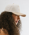 Gigi Pip trucker hats for women - Keep it Up Cowgirl Canvas Trucker Hat - 100% cotton canvas w/ cotton sweatband + reinforced from inner panel with 100% plolyester mesh trucker with Keep it Up Cowgirl embroidered on the front panel featuring an adjustable back strap [cream-tan]