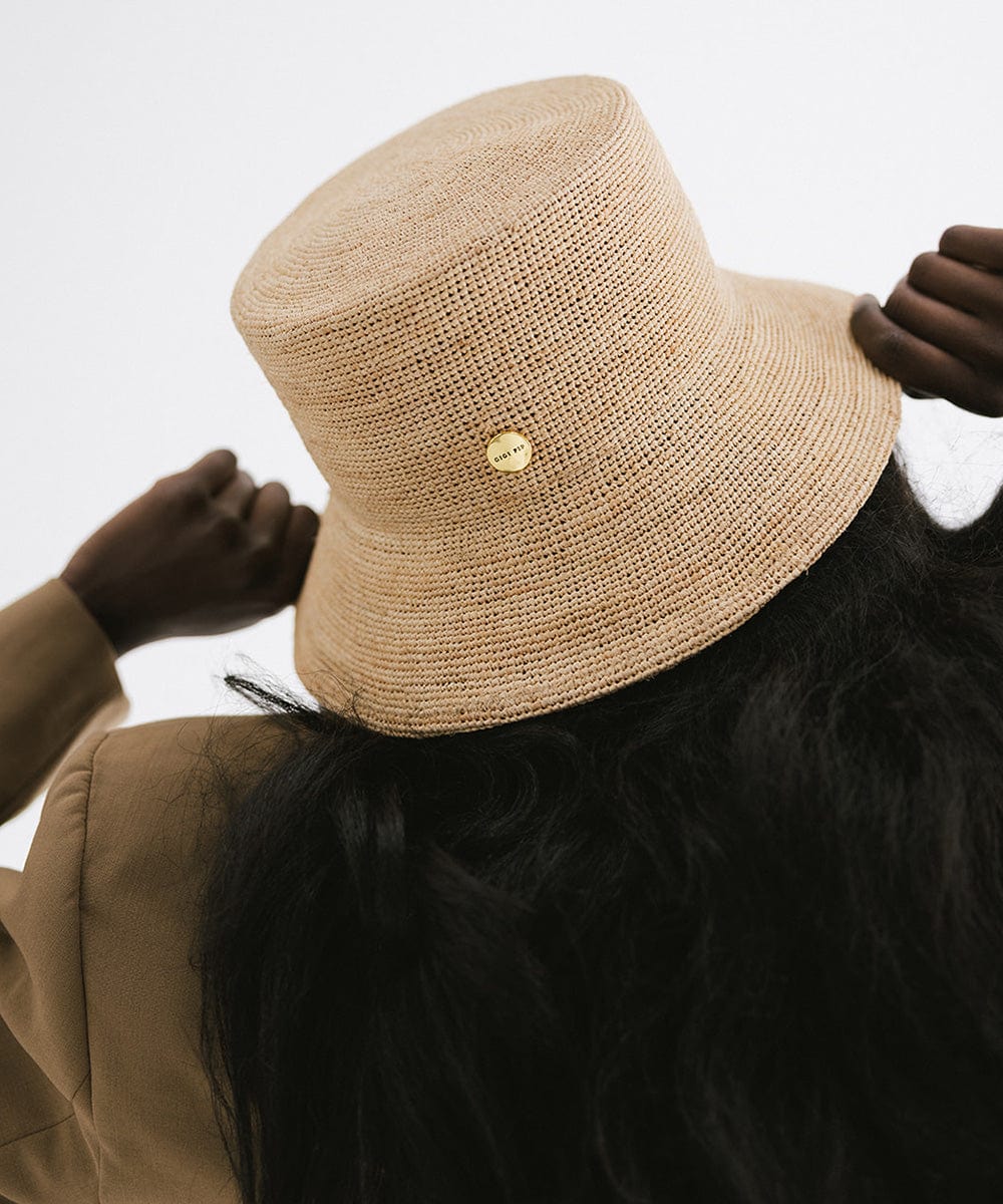 Gigi Pip bucket hats for women - Lana Straw Bucket Hat - 100% raffia straw packable friendly straw bucket hat with a gold gp pin on the back [natural]