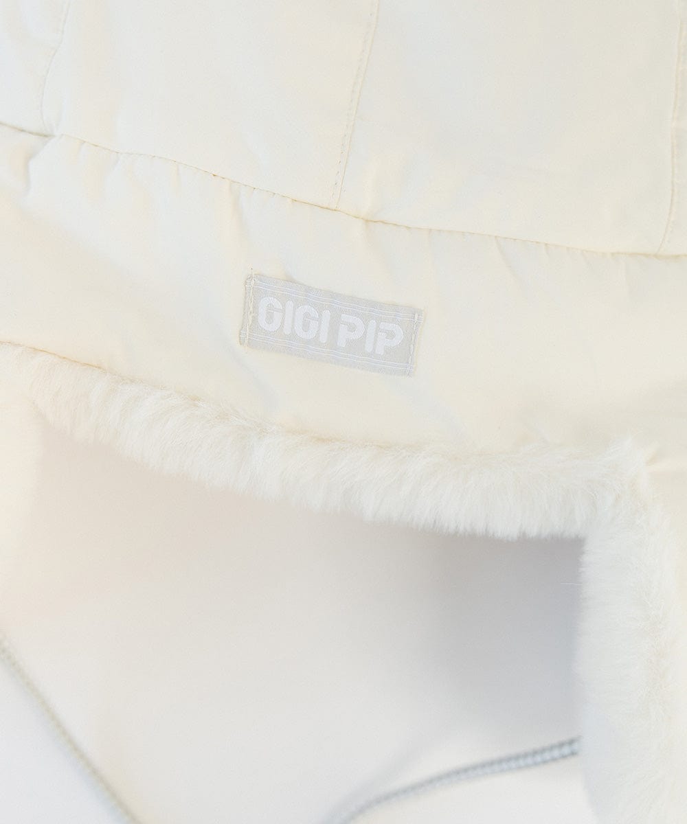 Gigi Pip winter hats for women - Leda Trapper Hat - 100% faux fur + polyester classic style inspired trapper hat featuring a retro limited edition holiday Gigi Pip logo [winter white]