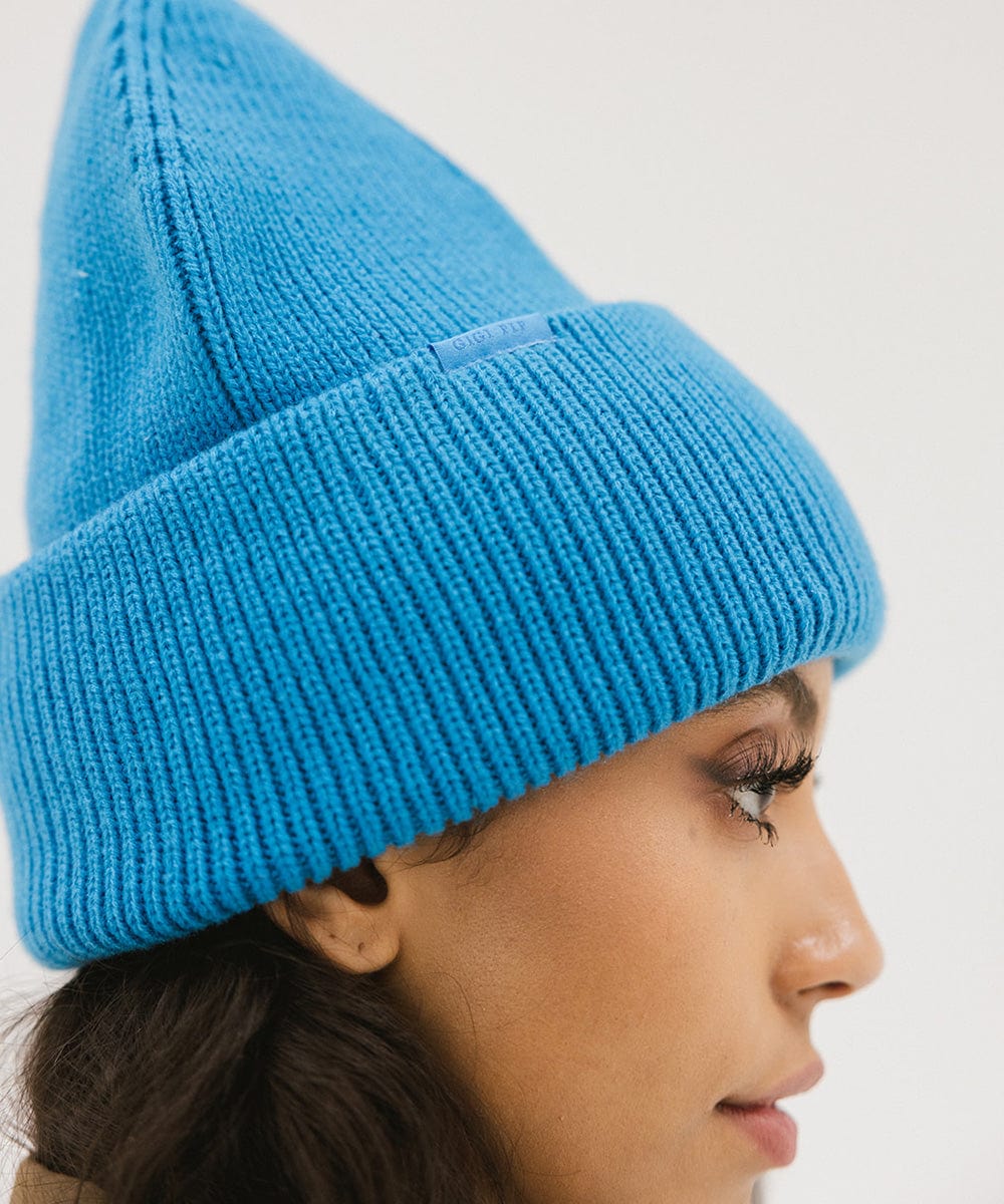 Gigi Pip beanies for women - Lou Knit Beanie - 100% Acrylic chunky oversized beanie featuring 4 neon color options with a tonal woven branded loop tag on the double fold [deja blue]