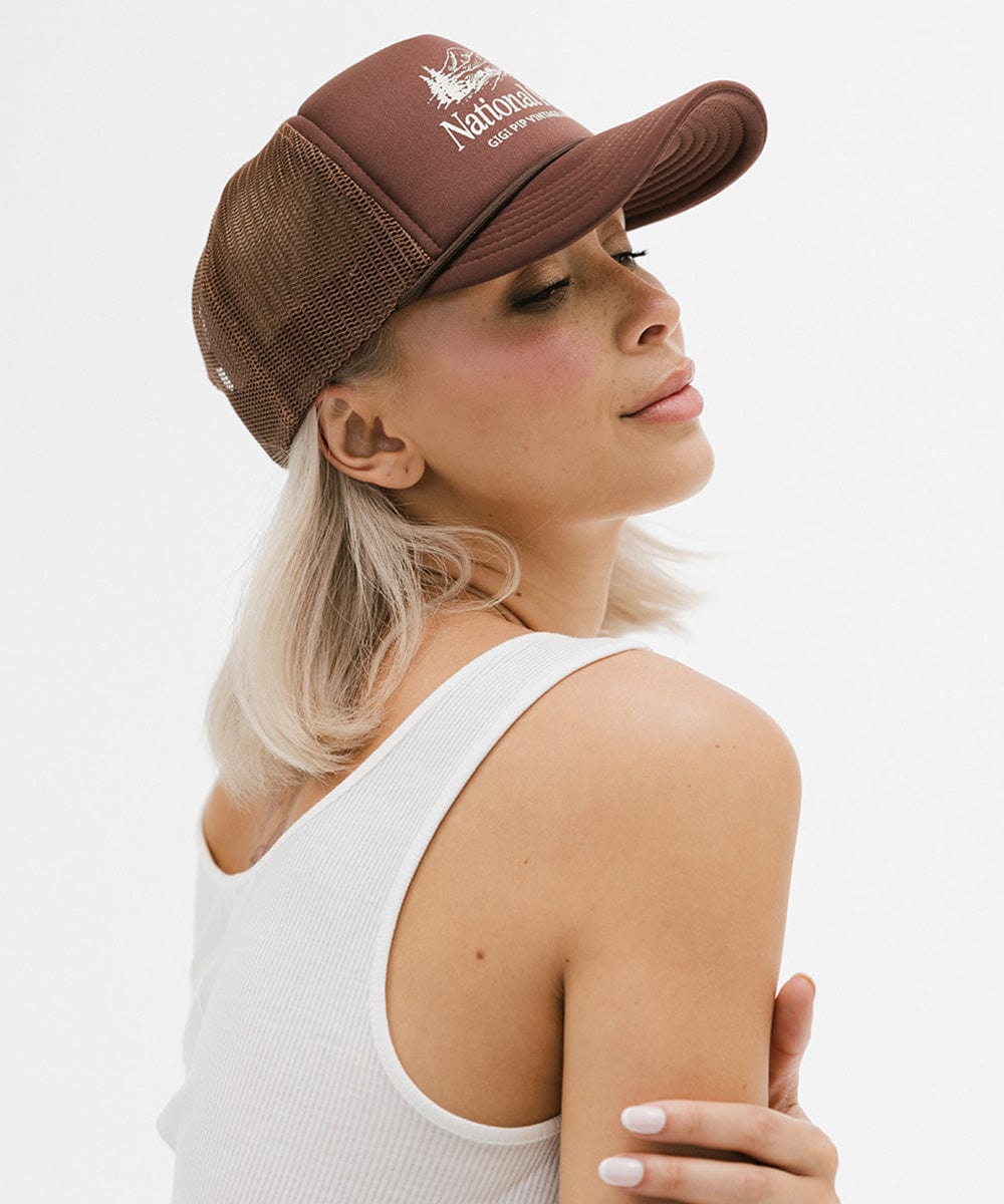 Gigi Pip trucker hats for women - National Parks Foam Trucker Hat - 100% polyester foam + mesh trucker hat with a curved brim featuring the words "National Parks" in a contrasting color as a design across the front panel [chocolate]