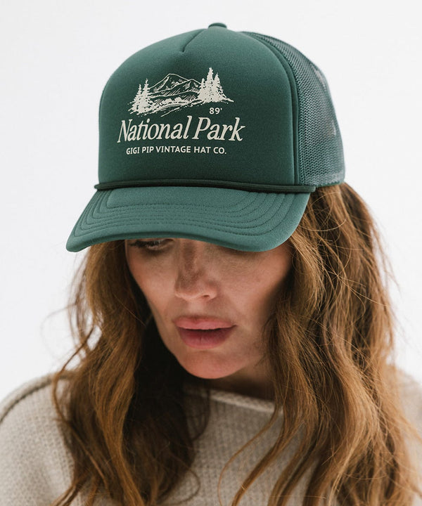 Gigi Pip trucker hats for women - National Parks Foam Trucker Hat - 100% polyester foam + mesh trucker hat with a curved brim featuring the words "National Parks" in a contrasting color as a design across the front panel [forest green]