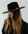 Gigi Pip felt hats for women - Raine Wide Brim Fedora - wide flat brim with a fedora crown, featuring a gold-plated removable paperclip brass chain with three faux pearls and a hand-sewn grosgrain band with the gold Gigi Pip bar around the crown, as well as a removable golden chain chinstrap [black]