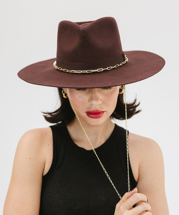 Gigi Pip felt hats for women - Raine Wide Brim Fedora - wide flat brim with a fedora crown, featuring a gold-plated removable paperclip brass chain with three faux pearls and a hand-sewn grosgrain band with the gold Gigi Pip bar around the crown, as well as a removable golden chain chinstrap [dark cherry]