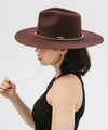 Gigi Pip felt hats for women - Raine Wide Brim Fedora - wide flat brim with a fedora crown, featuring a gold-plated removable paperclip brass chain with three faux pearls and a hand-sewn grosgrain band with the gold Gigi Pip bar around the crown, as well as a removable golden chain chinstrap [dark cherry]