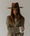 Gigi Pip felt hats for women - Raine Wide Brim Fedora - wide flat brim with a fedora crown, featuring a gold-plated removable paperclip brass chain with three faux pearls and a hand-sewn grosgrain band with the gold Gigi Pip bar around the crown, as well as a removable golden chain chinstrap [dark oak]