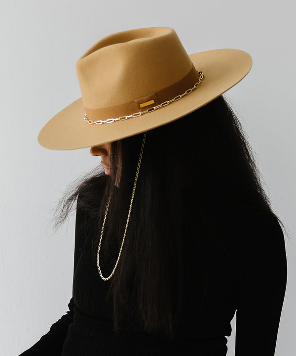 Gigi Pip felt hats for women - Raine Wide Brim Fedora - wide flat brim with a fedora crown, featuring a gold-plated removable paperclip brass chain with three faux pearls and a hand-sewn grosgrain band with the gold Gigi Pip bar around the crown, as well as a removable golden chain chinstrap [honeycomb]