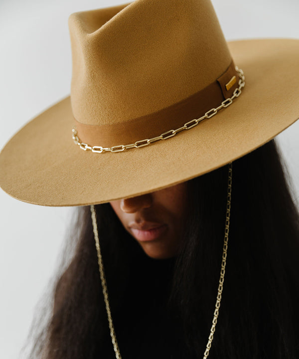 Gigi Pip felt hats for women - Raine Wide Brim Fedora - wide flat brim with a fedora crown, featuring a gold-plated removable paperclip brass chain with three faux pearls and a hand-sewn grosgrain band with the gold Gigi Pip bar around the crown, as well as a removable golden chain chinstrap [honeycomb]