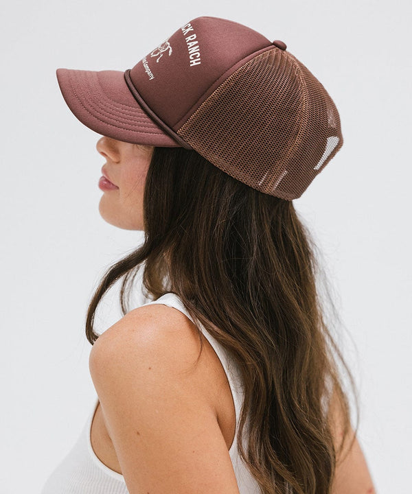 Gigi Pip trucker hats for women - Saddleback Foam Trucker Hat - 100% polyester foam + mesh trucker hat with a curved brim featuring the words "Saddleback Ranch" in a contrasting color as a design across the front panel [chocolate brown]