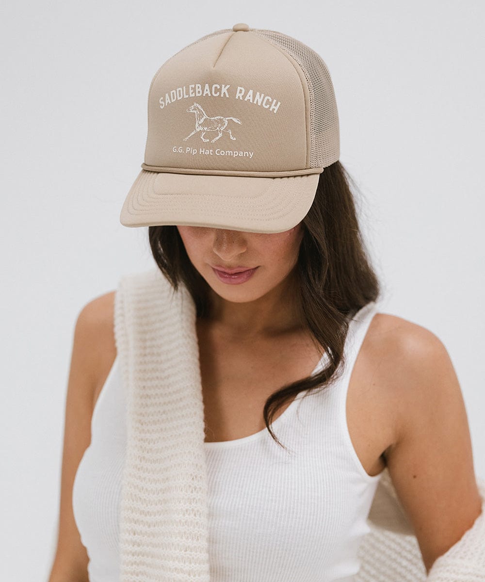 Gigi Pip trucker hats for women - Saddleback Foam Trucker Hat - 100% polyester foam + mesh trucker hat with a curved brim featuring the words "Saddleback Ranch" in a contrasting color as a design across the front panel [tan]