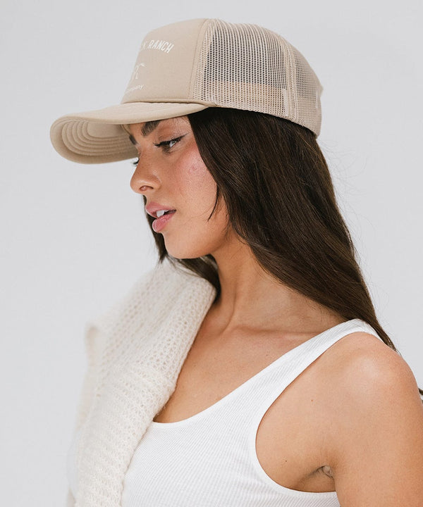 Gigi Pip trucker hats for women - Saddleback Foam Trucker Hat - 100% polyester foam + mesh trucker hat with a curved brim featuring the words "Saddleback Ranch" in a contrasting color as a design across the front panel [tan]