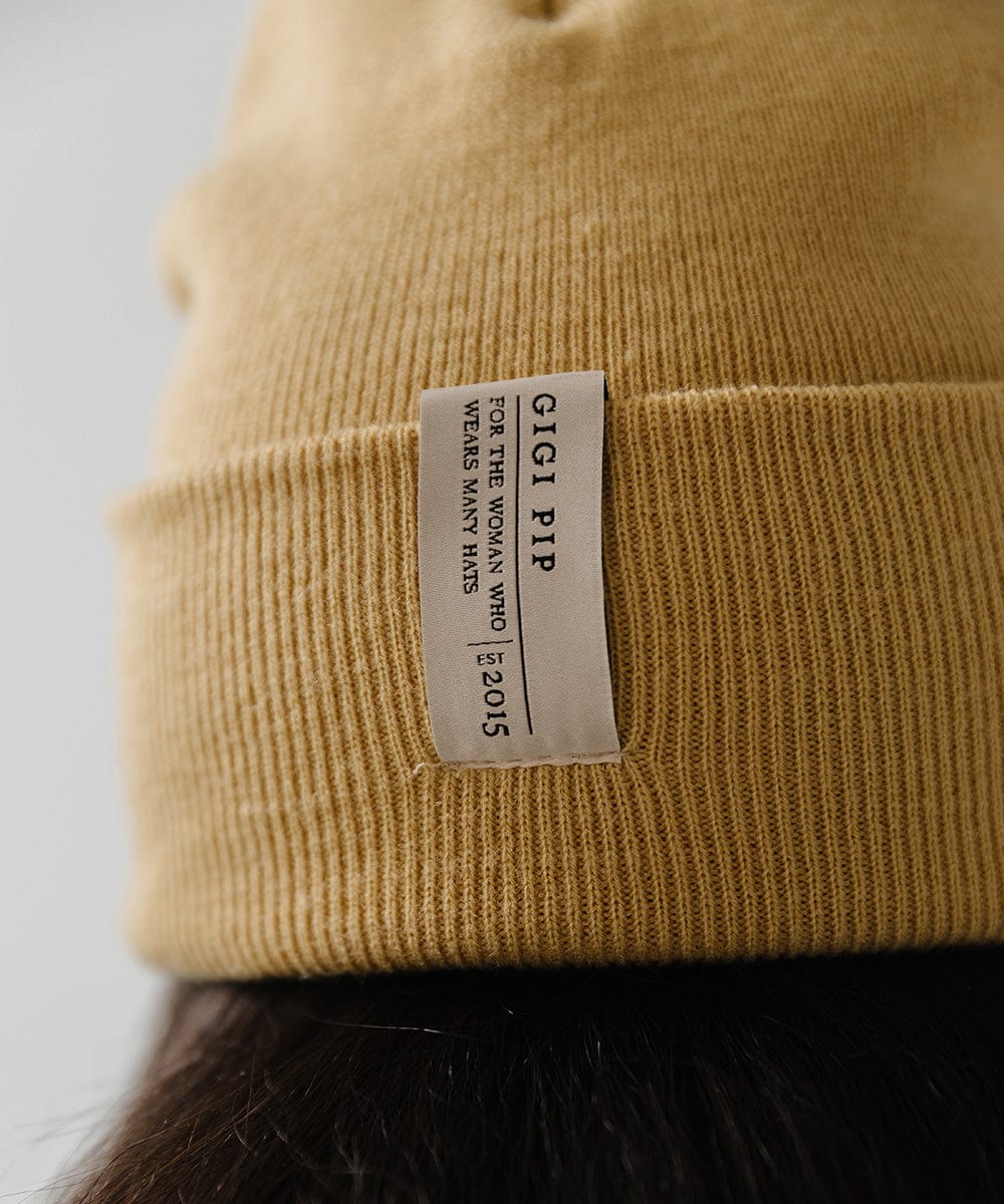 Gigi Pip beanies for women - Shay Beanie - 100% acrylic classic beanie featuring a stylized Gigi Pip loop tag on the fold that says “For the Woman Who Wears Many Hats” [honeycomb]