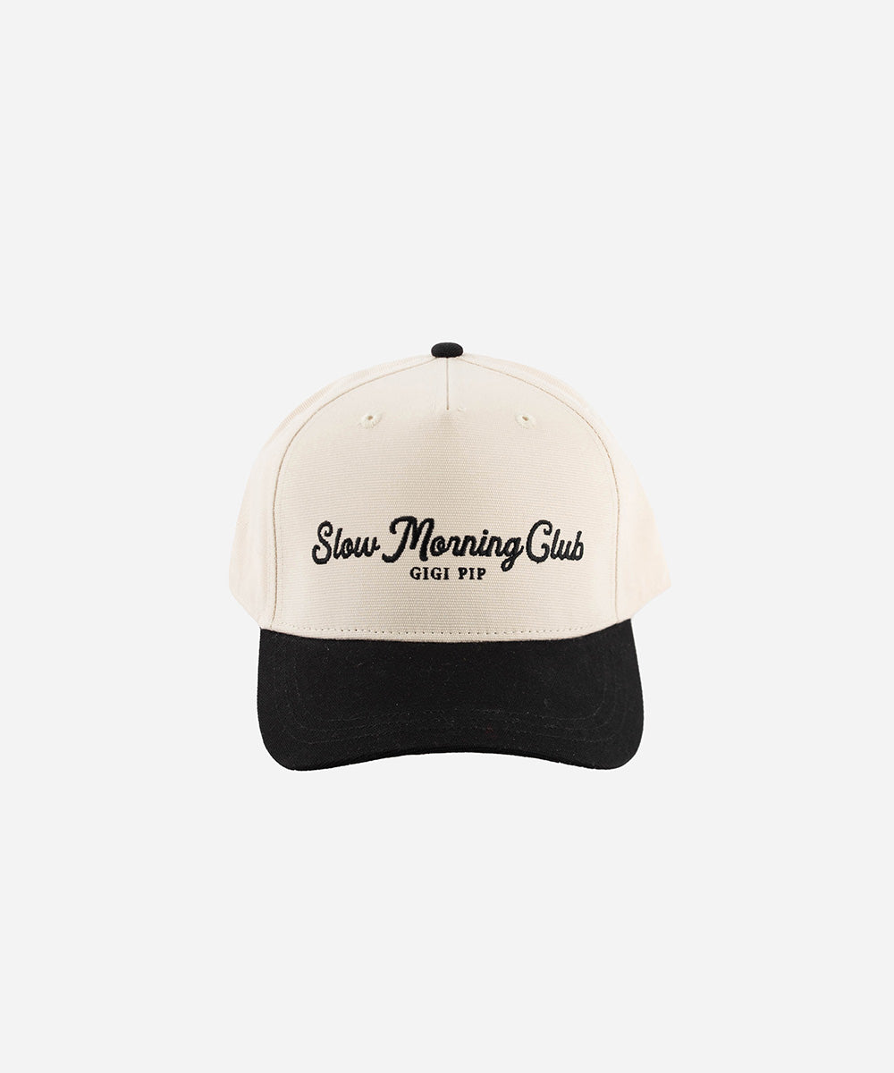 Gigi Pip trucker hats for women - Slow Morning Club Canvas Trucker Hat - 100% cotton canvas w/ cotton sweatband + reinforced from inner panel with 100% plolyester mesh trucker with Slow Morning Club embroidered on the front panel featuring an adjustable back strap [cream-black]