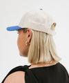 Gigi Pip trucker hats for women - Slow Morning Club Canvas Trucker Hat - 100% cotton canvas w/ cotton sweatband + reinforced from inner panel with 100% plolyester mesh trucker with Slow Morning Club embroidered on the front panel featuring an adjustable back strap [cream-blue]
