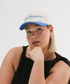 Gigi Pip trucker hats for women - Slow Morning Club Canvas Trucker Hat - 100% cotton canvas w/ cotton sweatband + reinforced from inner panel with 100% plolyester mesh trucker with Slow Morning Club embroidered on the front panel featuring an adjustable back strap [cream-blue]