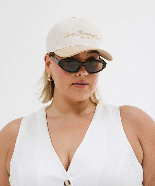 Gigi Pip trucker hats for women - Slow Morning Club Canvas Trucker Hat - 100% cotton canvas w/ cotton sweatband + reinforced from inner panel with 100% plolyester mesh trucker with Slow Morning Club embroidered on the front panel featuring an adjustable back strap [cream-tan]