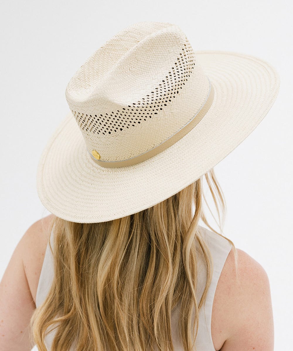 Gigi Pip western straw cowgirl hats for women - a paper straw western cattleman crown cowgirl hat with a casual semi floppy flat brim for the summer featuring a GP pin on the back [natural]