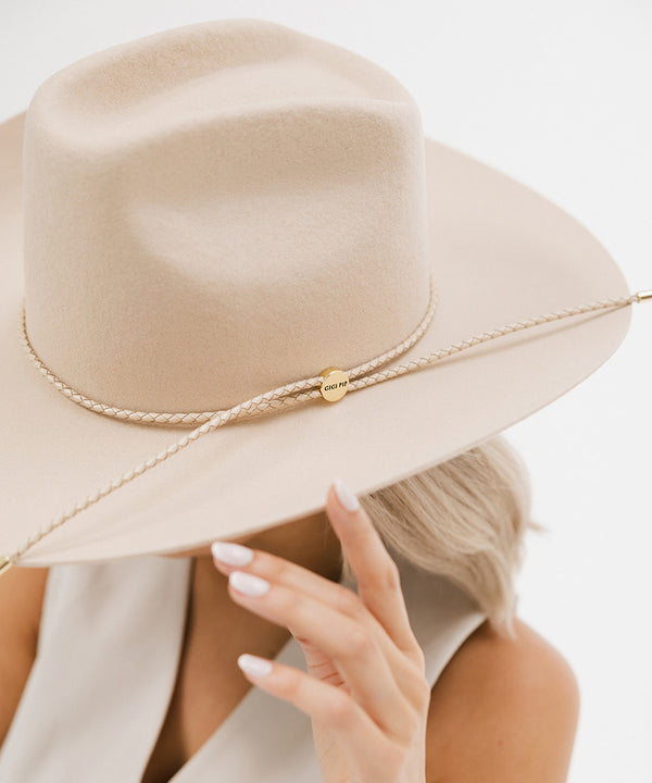 Gigi Pip hat bands + trims for women's hats - Thin Braided Wrap Band - thin braided leather adjustable hat band featuring a plated gold Gigi Pip circle logo and detailing [beige]