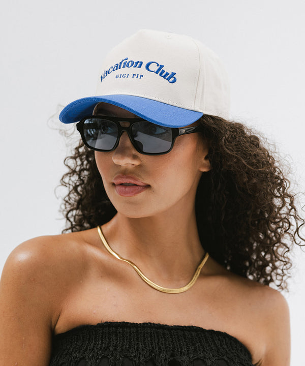 Gigi Pip trucker hats for women - Vacation Club Canvas Trucker Hat - 100% cotton canvas w/ cotton sweatband + reinforced from inner panel with 100% plolyester mesh trucker with Vacation Club embroidered on the front panel featuring an adjustable back strap [cream-blue]