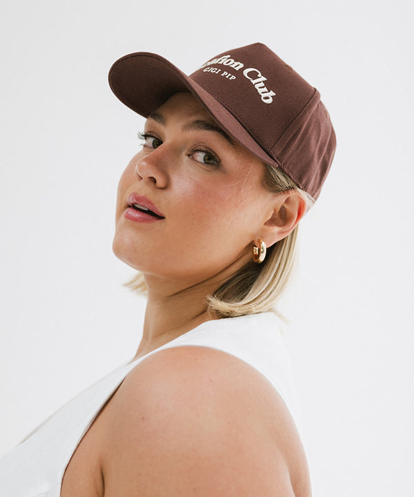 Gigi Pip trucker hats for women - Vacation Club Canvas Trucker Hat - 100% cotton canvas w/ cotton sweatband + reinforced from inner panel with 100% plolyester mesh trucker with Vacation Club embroidered on the front panel featuring an adjustable back strap [brown]