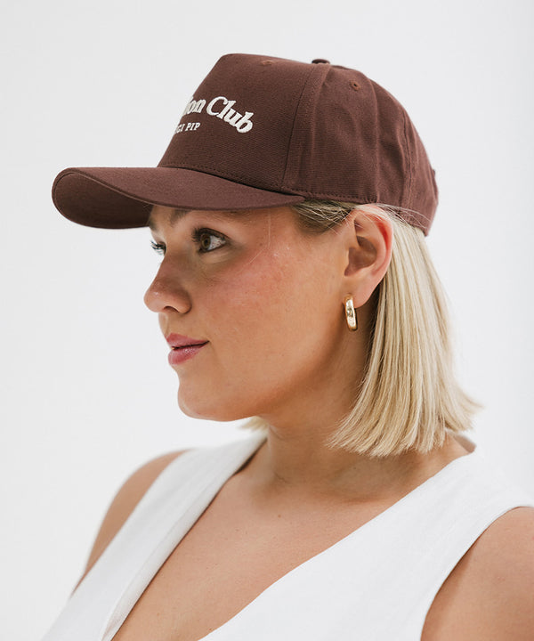 Gigi Pip trucker hats for women - Vacation Club Canvas Trucker Hat - 100% cotton canvas w/ cotton sweatband + reinforced from inner panel with 100% plolyester mesh trucker with Vacation Club embroidered on the front panel featuring an adjustable back strap [brown]