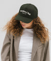 Gigi Pip trucker hats for women - Vacation Club Canvas Trucker Hat - 100% cotton canvas w/ cotton sweatband + reinforced from inner panel with 100% plolyester mesh trucker with Vacation Club embroidered on the front panel featuring an adjustable back strap [dark green]