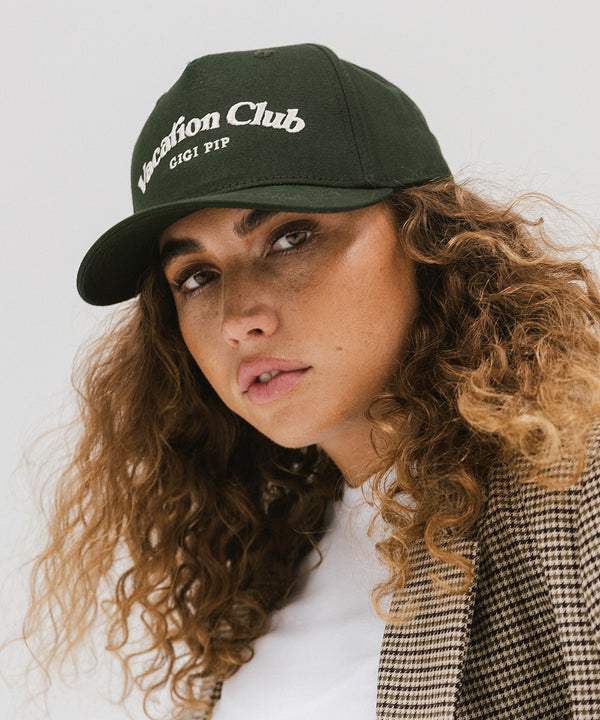 Gigi Pip trucker hats for women - Vacation Club Canvas Trucker Hat - 100% cotton canvas w/ cotton sweatband + reinforced from inner panel with 100% plolyester mesh trucker with Vacation Club embroidered on the front panel featuring an adjustable back strap [dark green]