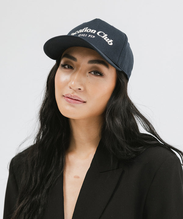 Gigi Pip trucker hats for women - Vacation Club Canvas Trucker Hat - 100% cotton canvas w/ cotton sweatband + reinforced from inner panel with 100% plolyester mesh trucker with Vacation Club embroidered on the front panel featuring an adjustable back strap [navy]